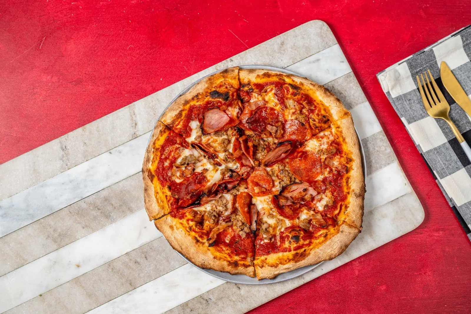 Overhead view of a pizza at Fortify Pizza & Burger Bar in Clayton