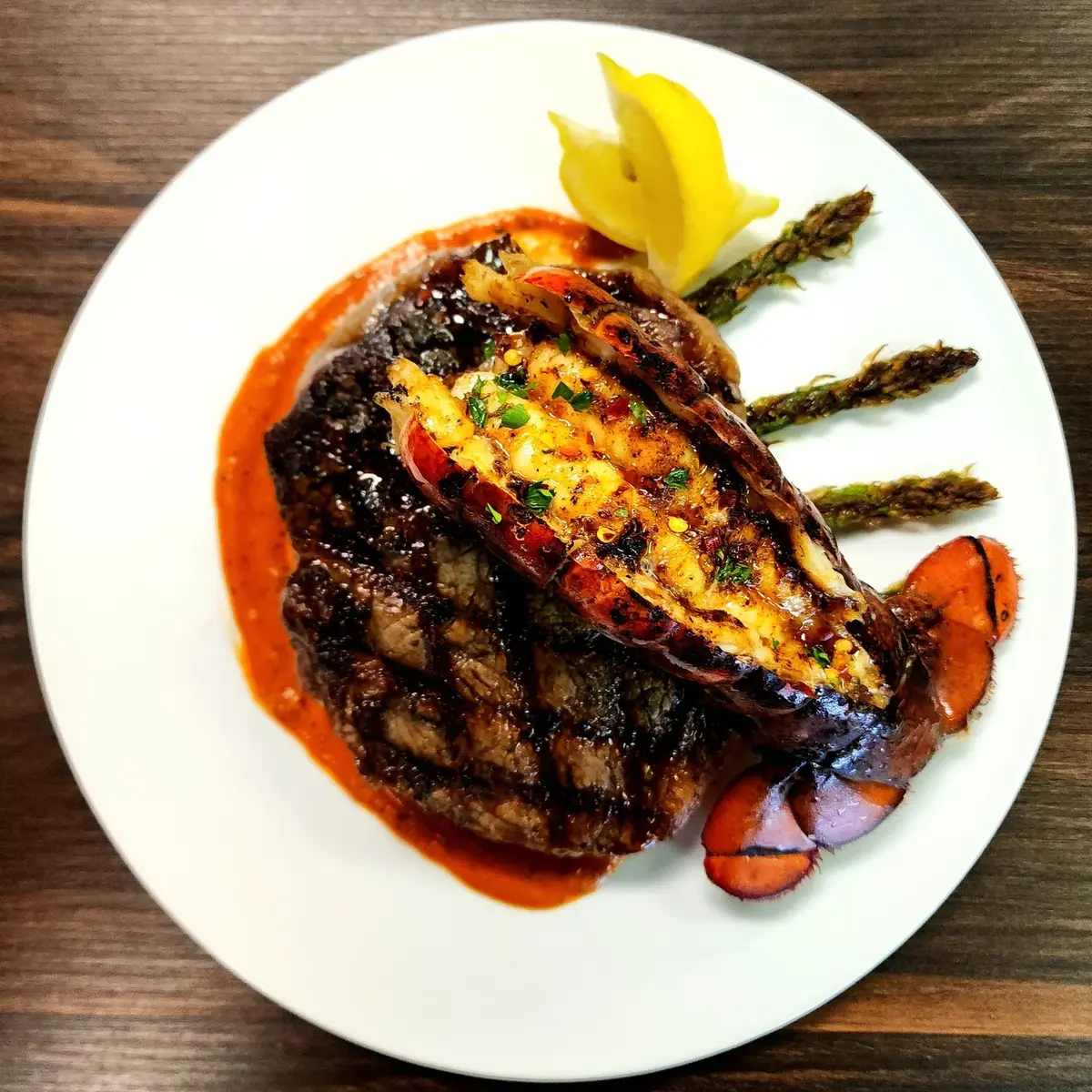 Steak and lobster dish photographed by Nacoochee Grill in Helen