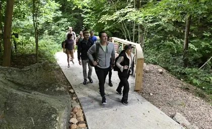 Hikers on the paved West Ridge access trail at Amicalola Falls State Park