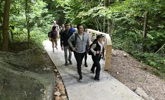 Hikers on the paved West Ridge access trail at Amicalola Falls State Park