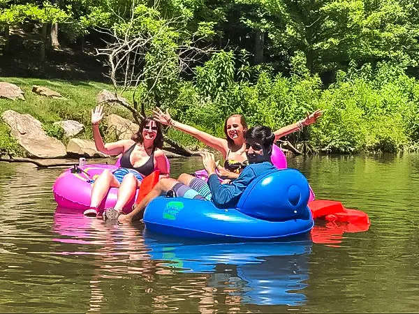 Guests tubing on the Cartecay River with Cartecay River Experience