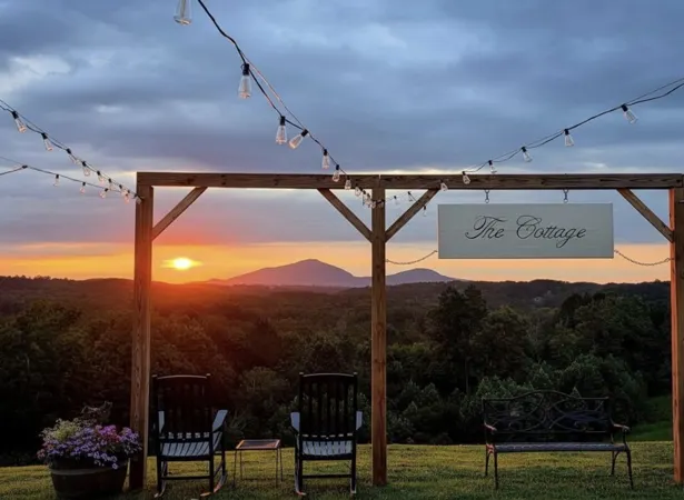 Sunset mountain view from The Cottage winery pergola